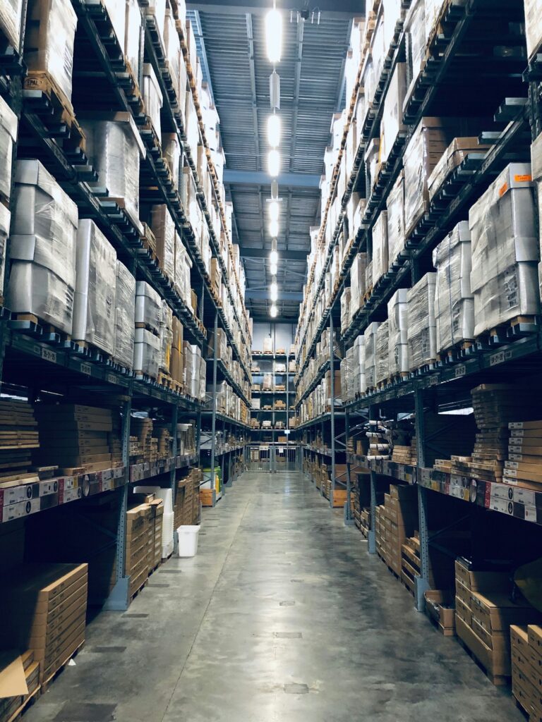 Warehouse aisle with stocked shelves